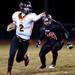 Tecumseh senior quarterback Ben Dreslinski points to pick up a block against Milan on Friday. Tecumseh won 26-6. Daniel Brenner I AnnArbor.com]